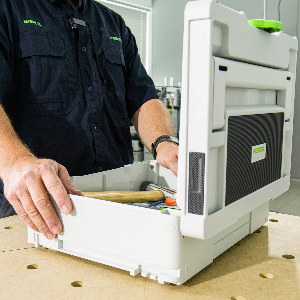 End view of Festool Top Rock Bluetooth Speaker Systainer toolbox showing speaker grate in top and end of lid.