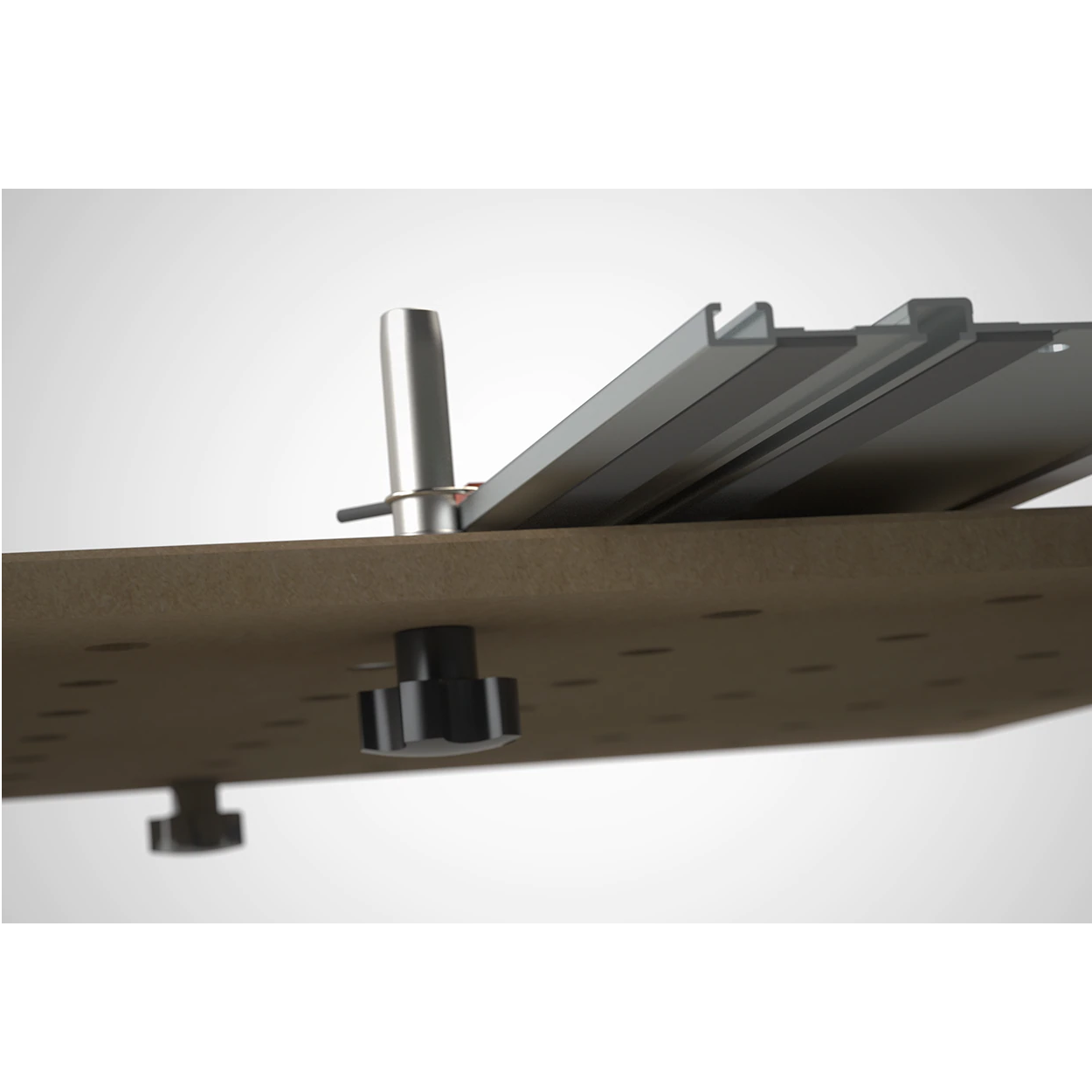 A pair of SpeedKnobs secure Tall DoubleGroove dogs to a MFT-style work surface. A track saw guide rail is attached with clips