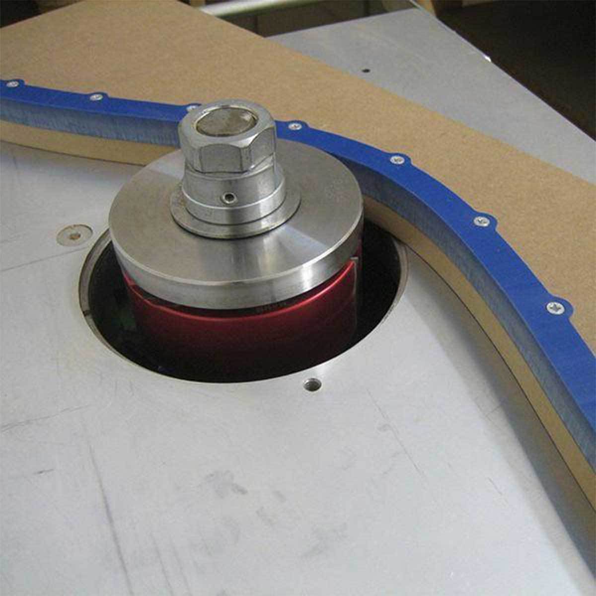 A Kurvenlinfix flexible curve is screwed to a piece of MDF and a shaper has trimmed it to match the profile.