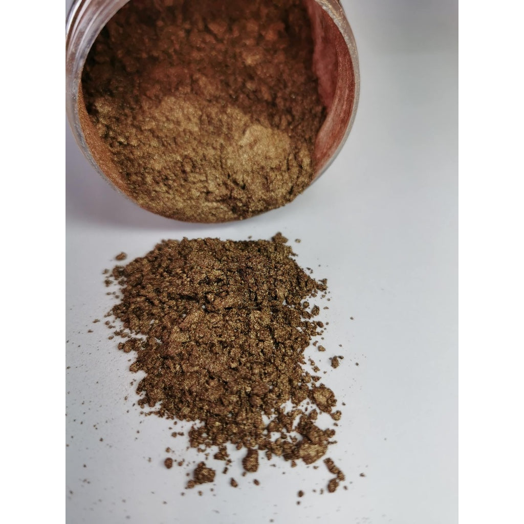 A jar of Cappuccino Ryver Epoxy Aurora Metallic Pigment on its side showing the actual colour and consistency of mica.