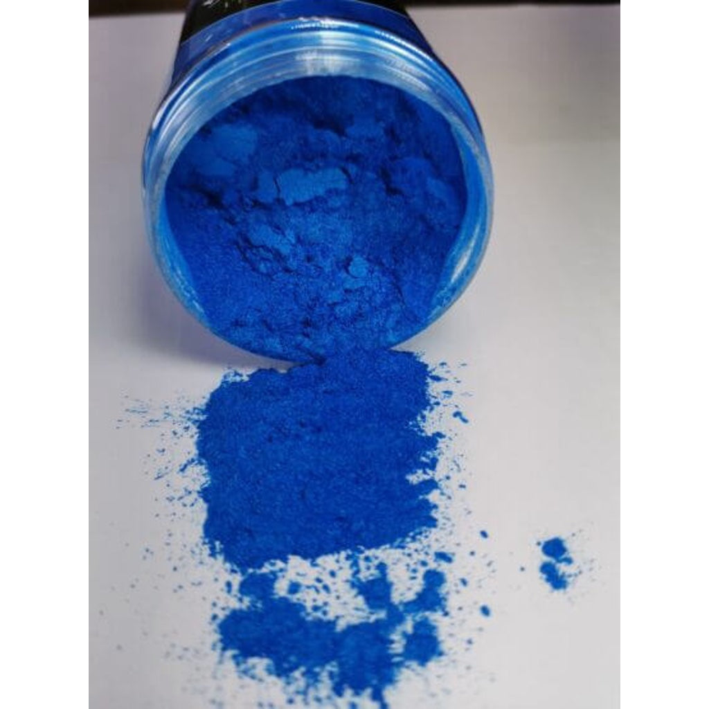 A jar of Sky Blue Ryver Epoxy Aurora Metallic Pigment on its side showing the actual colour and consistency of mica.