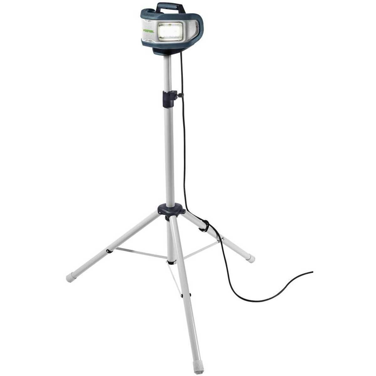 The SysLite Duo sits on the fully-deployed tripod facing left, the its power cord neatly attached to the tripod.