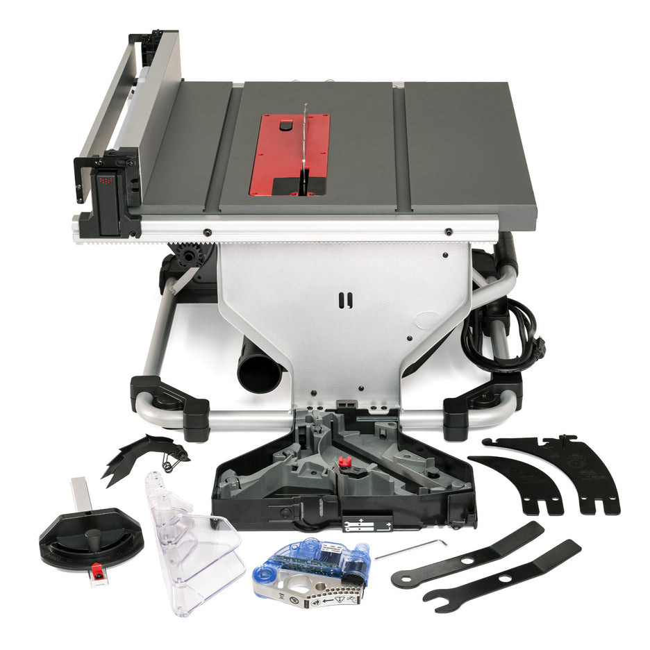 Back of SawStop Compact Table Saw with storage compartment open and components laid out.