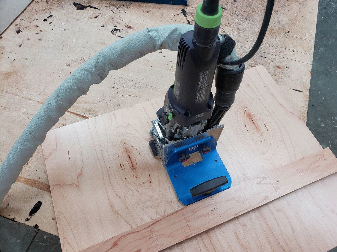 The TSO Products BigFoot right angle support being used to plunge a mortise in face of plywood w/the Festool Domino DF 500.