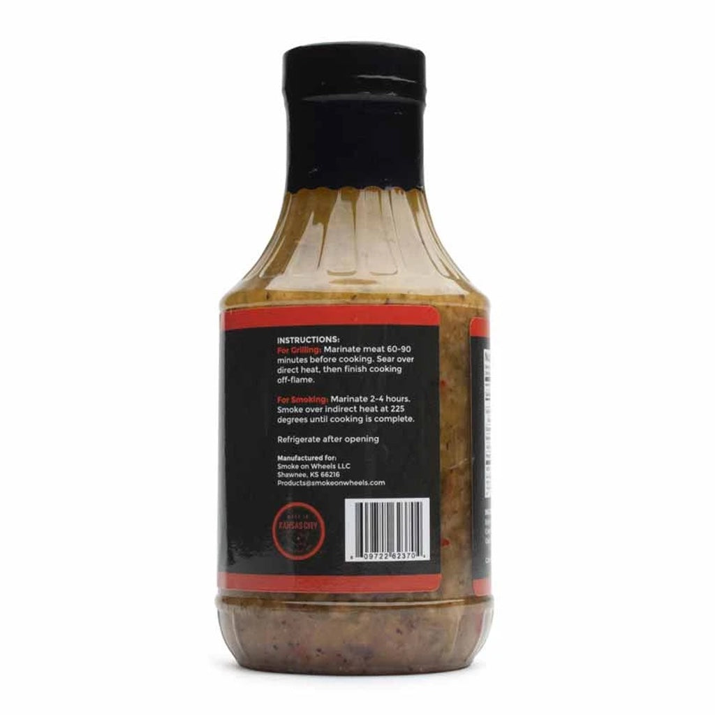 Glass jar showing side of label with instructions and details of Smoke on Wheels BBQ Marinade.