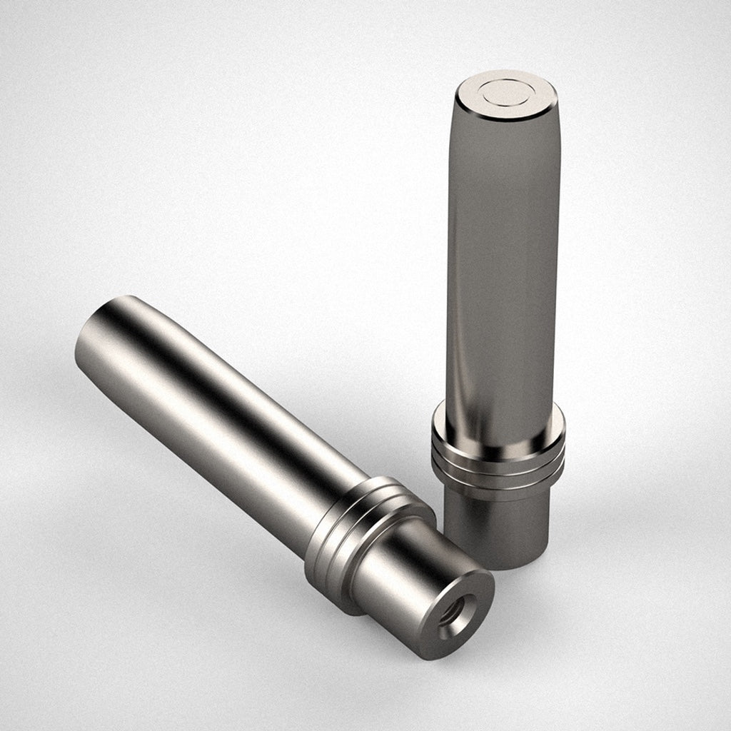 Two Close Fit DoubleGroove Tall Dogs, one standing and one laying down showing the tapered tip and threaded hole.