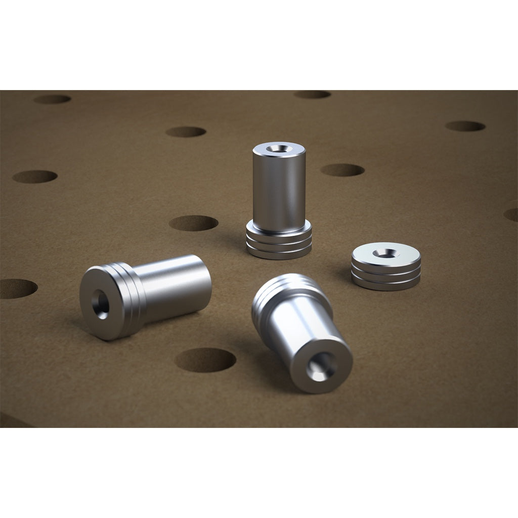 Four TSO Products Close Fit Large Dogs in and on a MDF worktop with 20mm holes, showing the DoubleGroove grip & details.