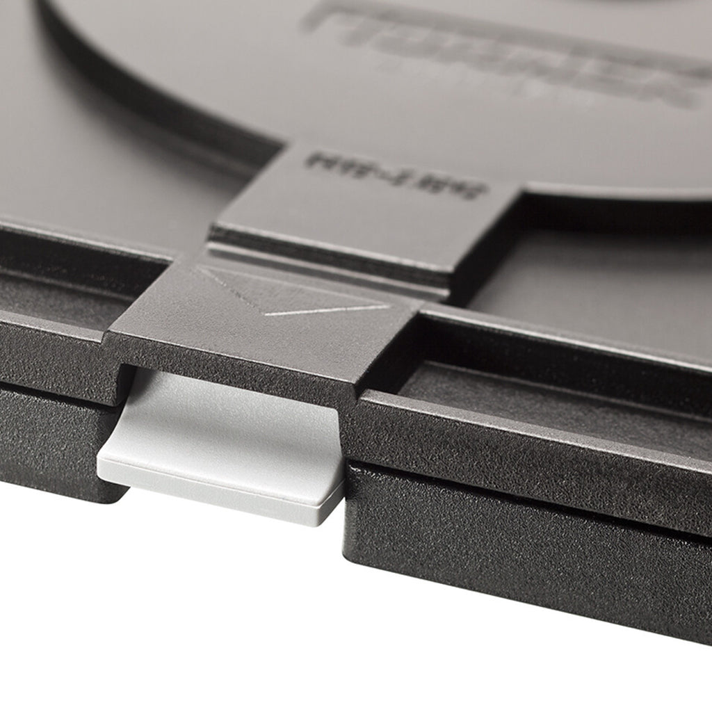 A simple and secure lock automatically engages and can be released with a finger to turn the machine 180 degrees.