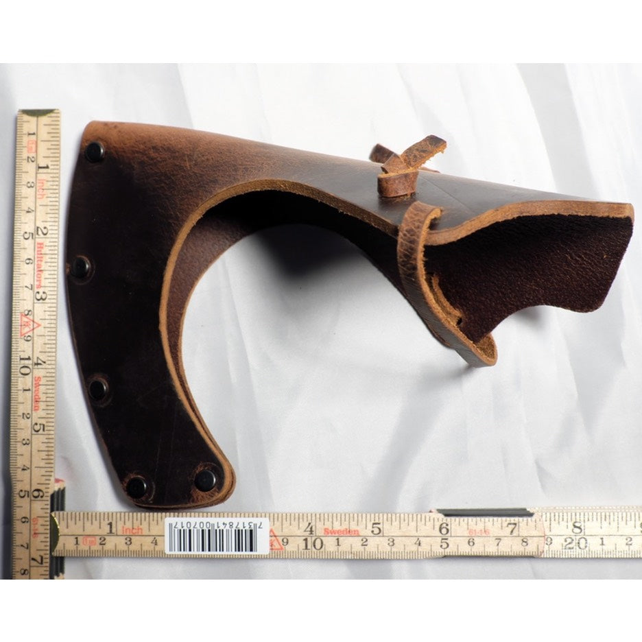 Weaver Leather Axe Sheath with wooden folding rule for scale.