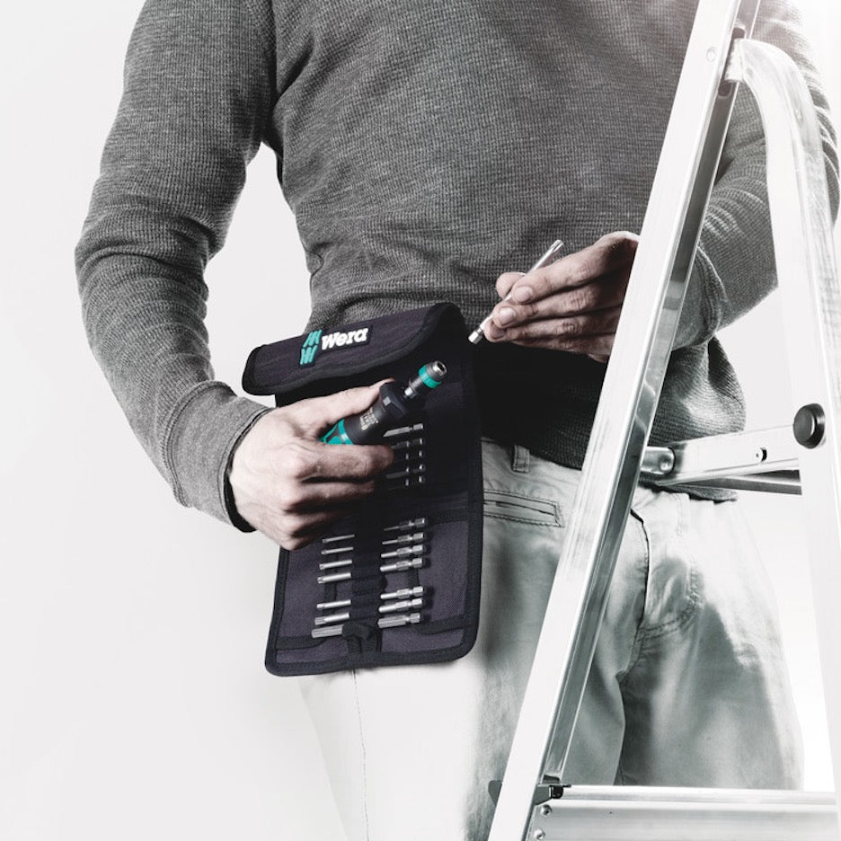 Wera Tools 17-Piece Imperial Kraftform Kompakt Screwdriver changing bits on ladder