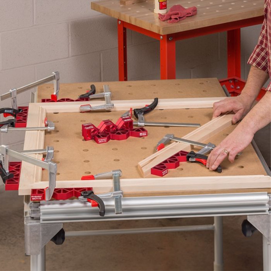 Woodworker assembles casing on MFT with Woodpeckers Mitre Clamping Tools.