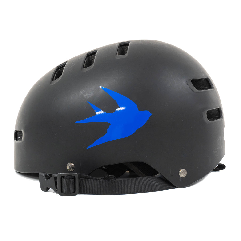 A black bicycle helmet with a custom blue vinyl decal made with Yeti Tool's CNC Stylus.