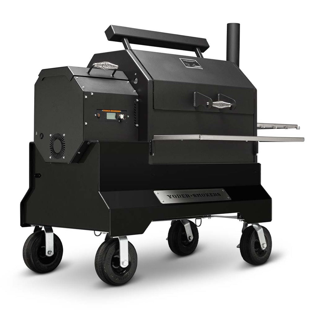 Front left view of the Yoder Smokers YS640S Pellet Grill on black Competition Cart with pneumatic wheels.