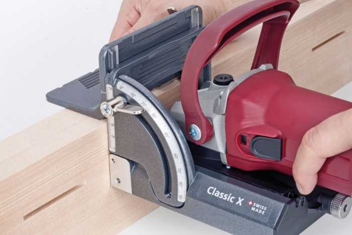 Lamello Classic X Biscuit Joiner cutting into face of solid hardwood