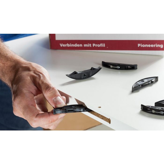 Lamello Clamex P-14 Flexus connectors slide/rotate into the T-shaped P-System slots in a melamine coated panel.