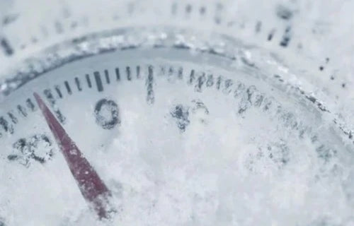 Thermometer covered in ice 