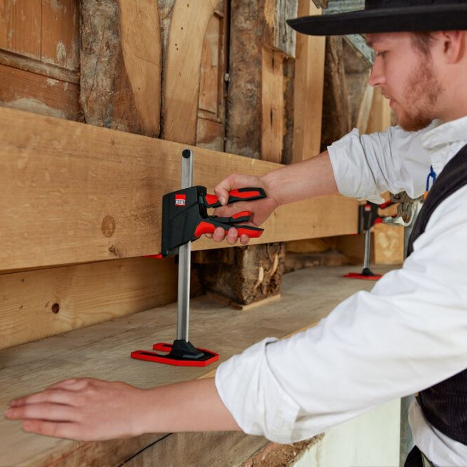 Person using Bessey Tools Beyceps on wooden planks