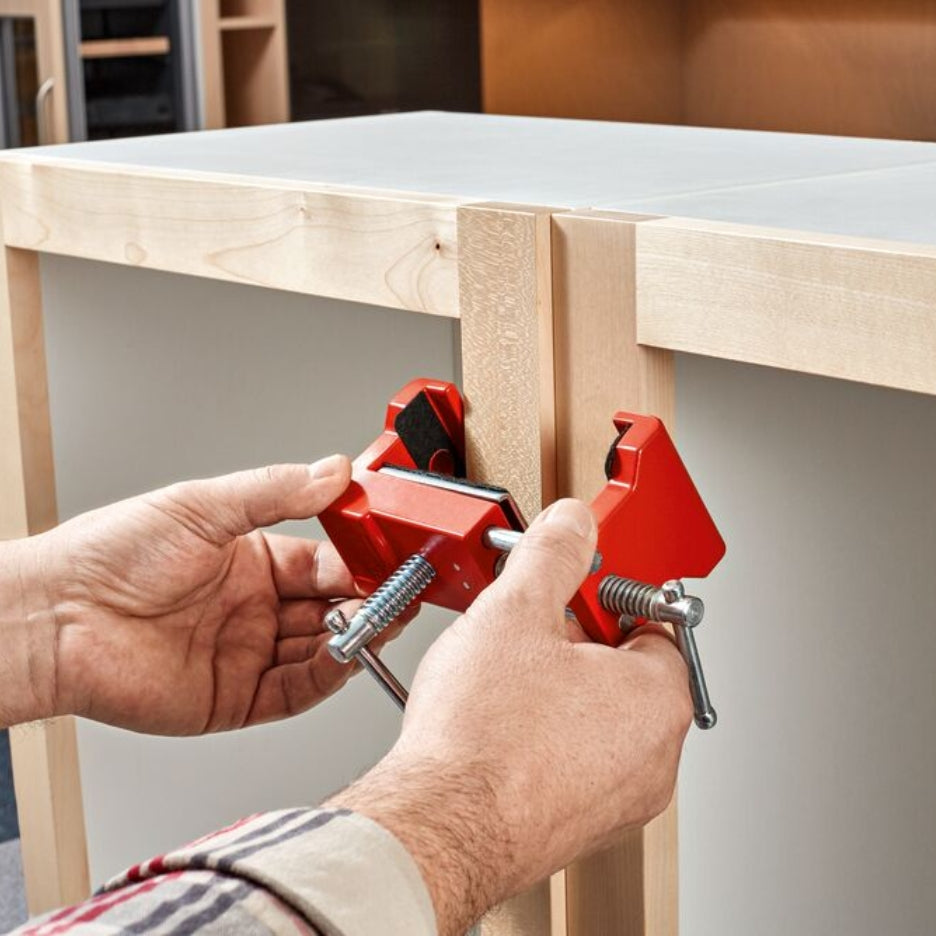 Person using Bessey Tools Cabinetry Face Frame Clamp on a wooden frame