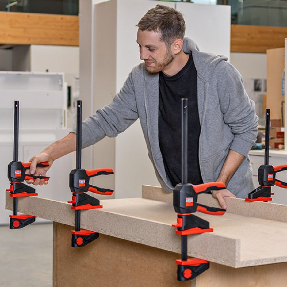 Multiple Bessey Tools Large Trigger Clamps being used at once to hold project in place