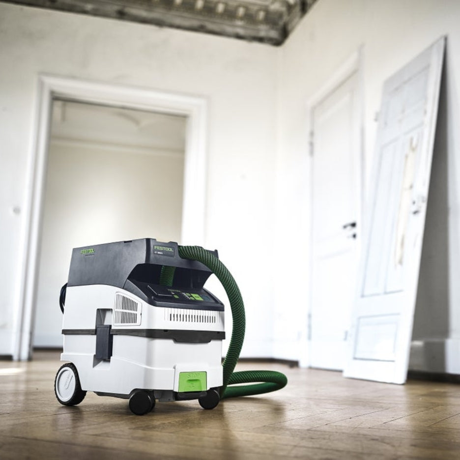 Festool 15 Litre Cleantec HEPA Dust Extractor with Autostart and Bluetooth CT Midi I HEPA on a wooden floor in an empty room