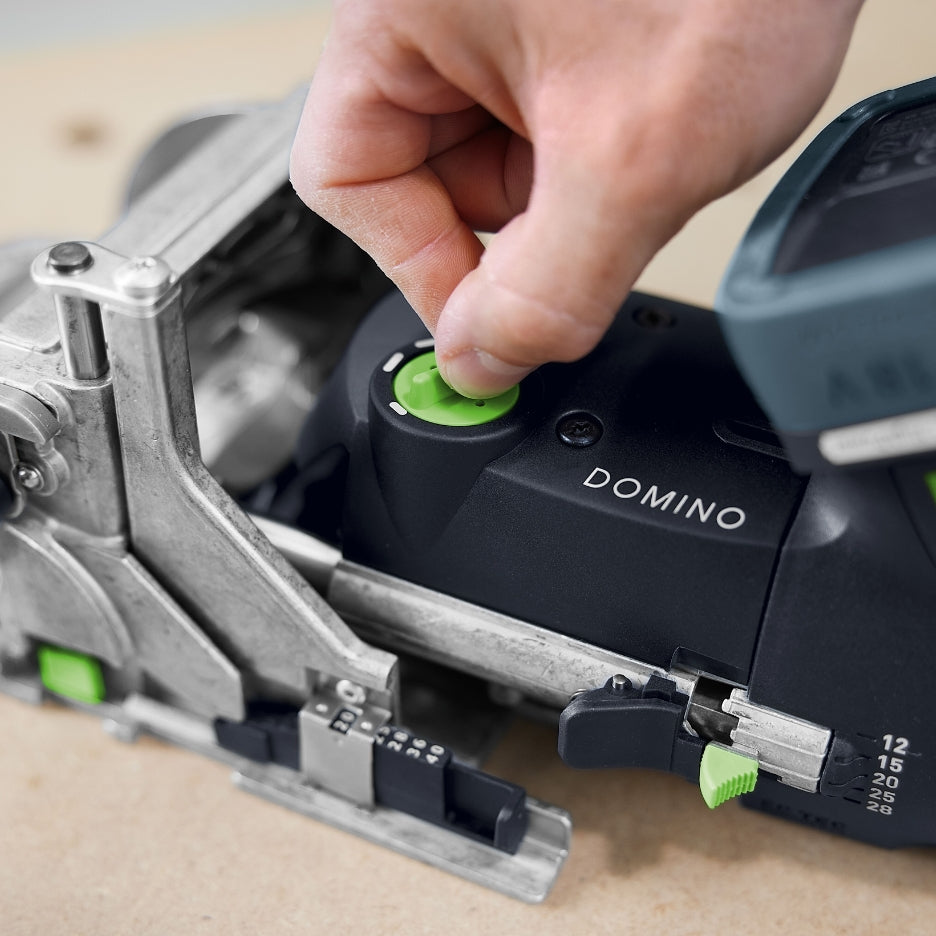 Person adjusting Festool Cordless Domino Joiner DFC 500 fit