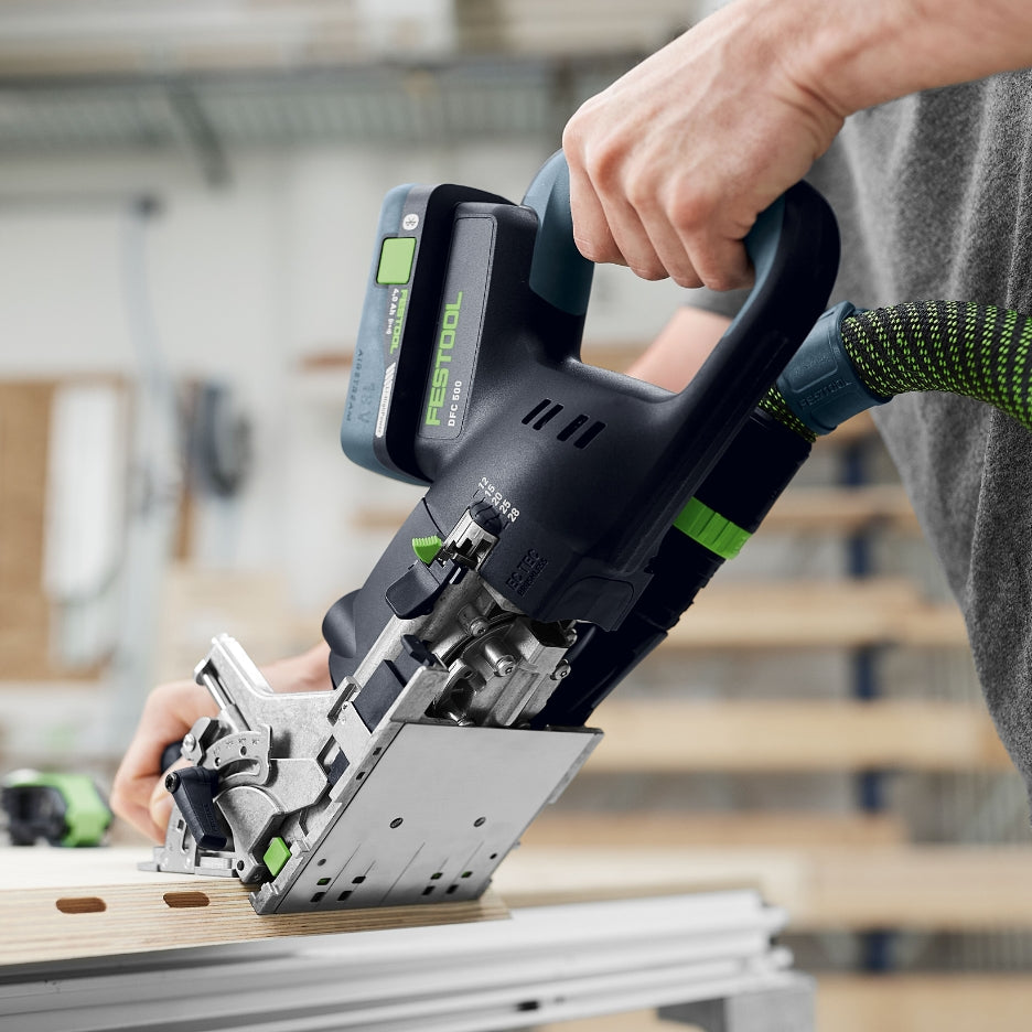 Person using Festool Cordless Domino Joiner DFC 500 for mitre joints