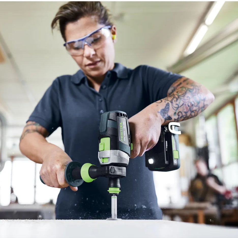 Woman using Festool Cordless Hammer Drill TPC 18/4 and handle