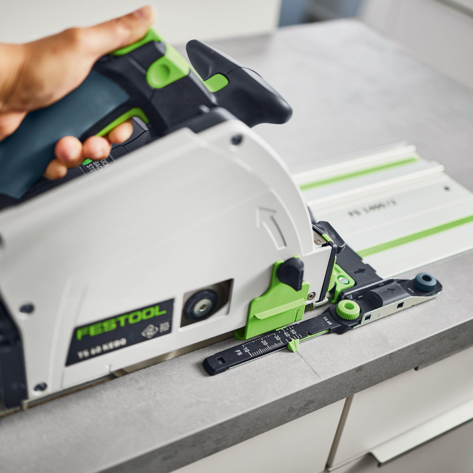 Depth Position Indicator is lined up with a pencil line on the workpiece, and track saw has reached the end stop.