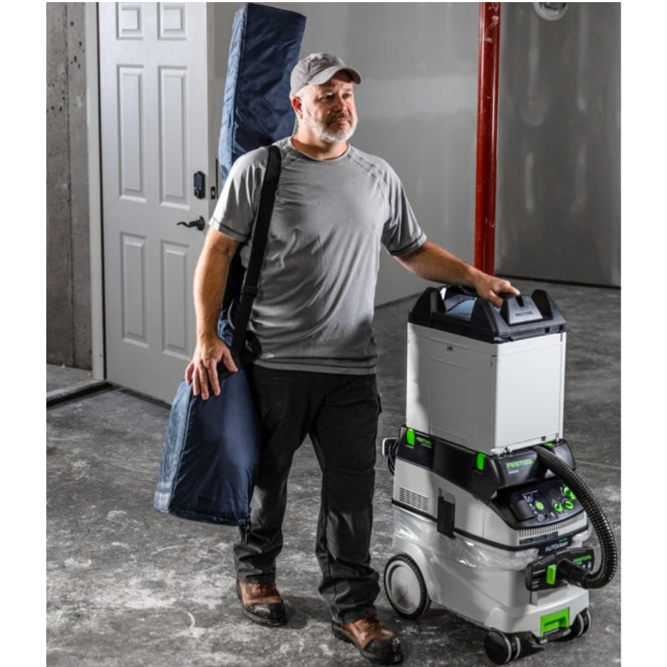 Man carrying Festool Drywall Sander LHS 2-M 225 EQ Planex  and dust extractor
