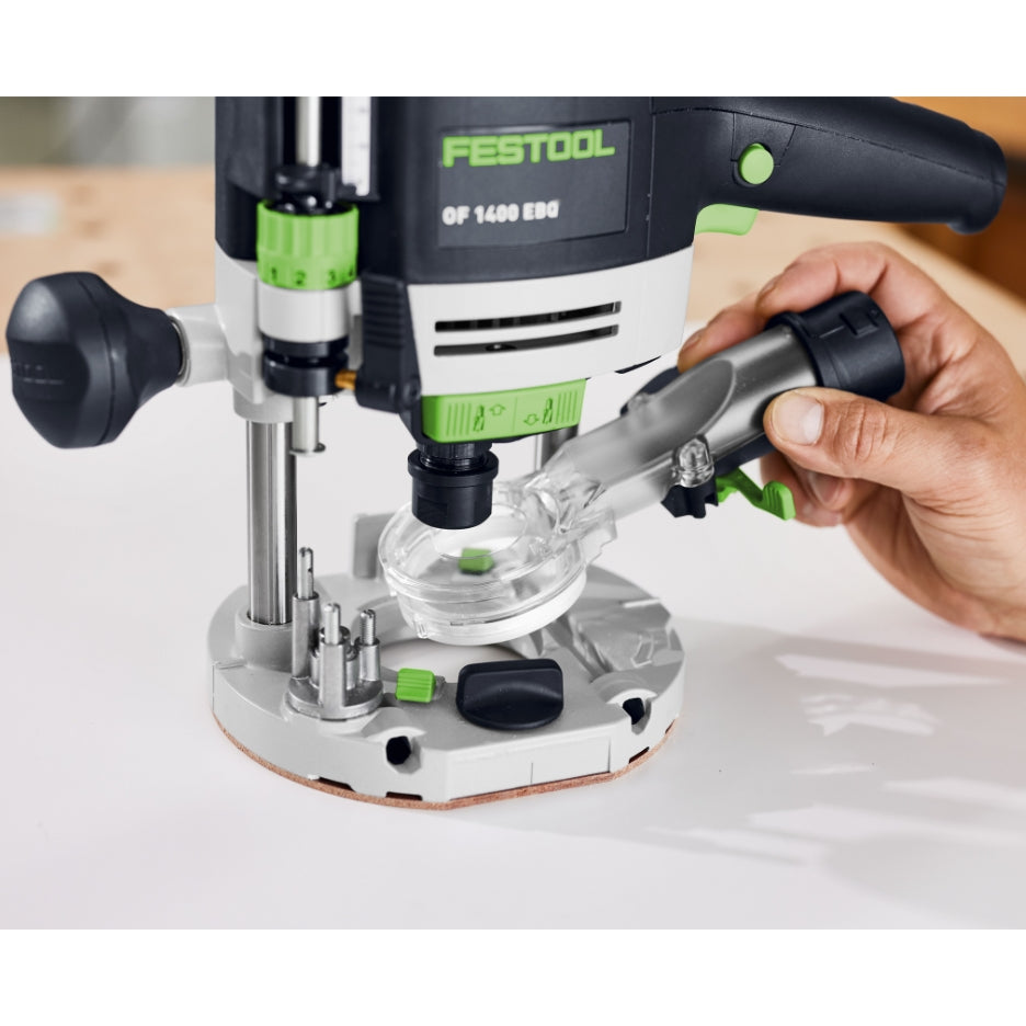 Hand holding Festool Extraction Hood with Light Module close to a Festool Plunge Router OF 1400
