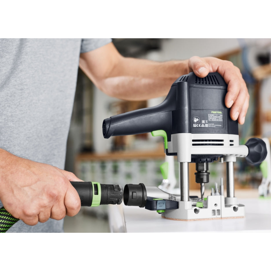 Hands attaching dust extractor hose to Festool Plunge Router OF 1400 