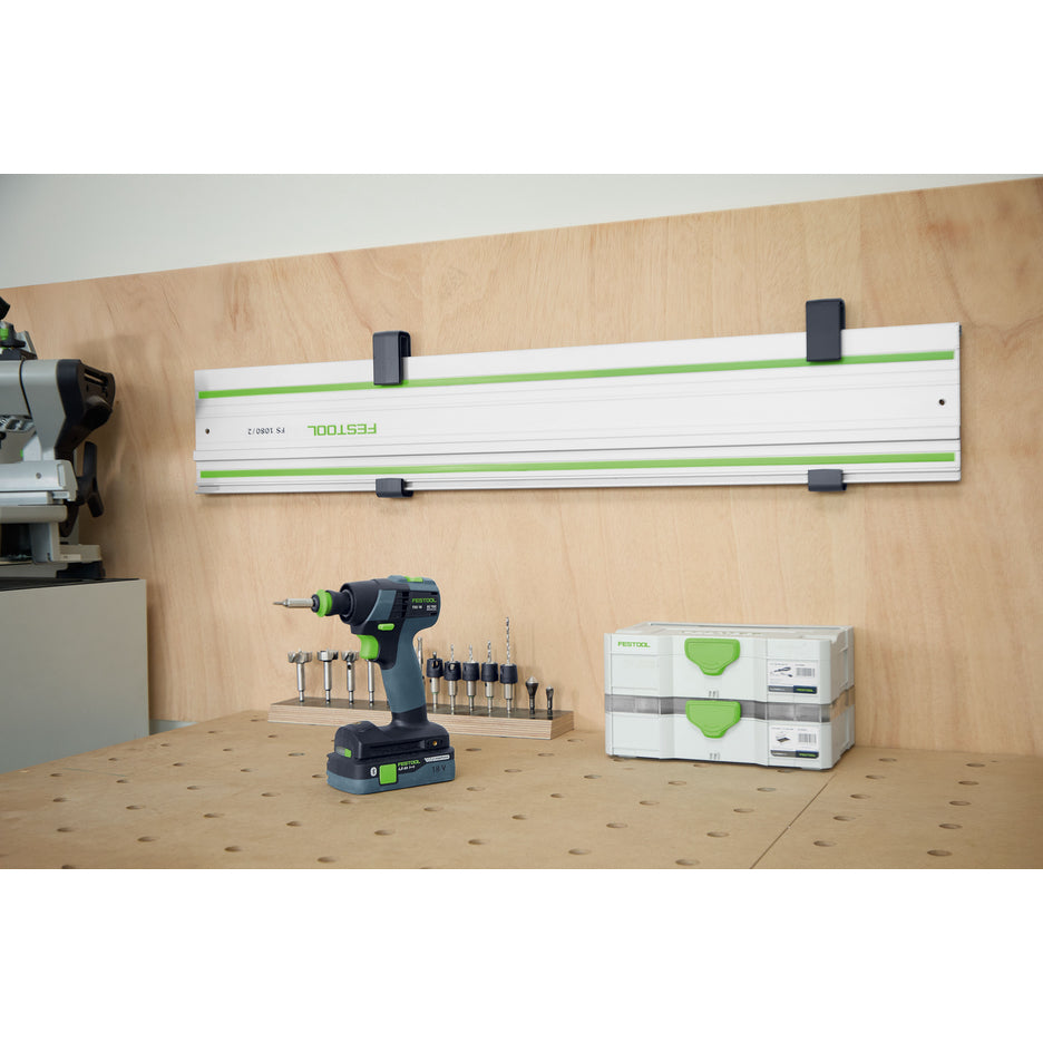 A Festool FS 1400 guide rail stored horizontally on a wall above a MFT using Guide Rail Holder brackets.