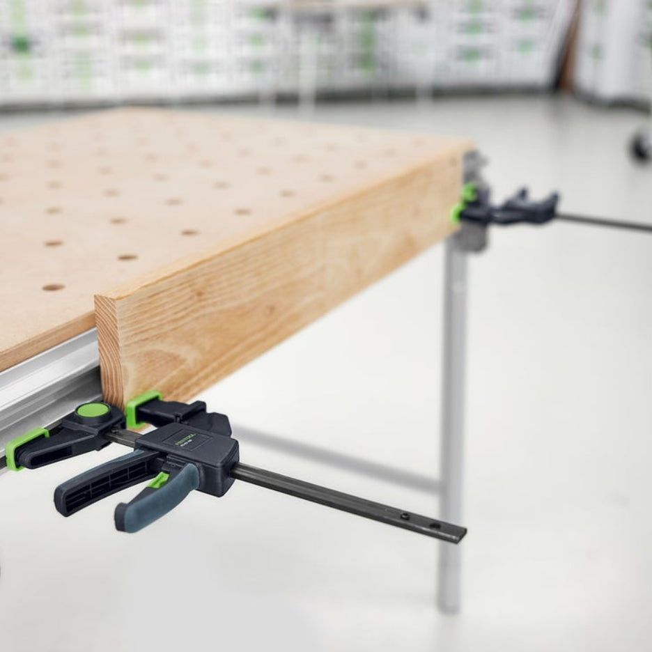 Festool One-Handed Clamp FS-EZ 150 holding a piece of wood on a multifunction table.