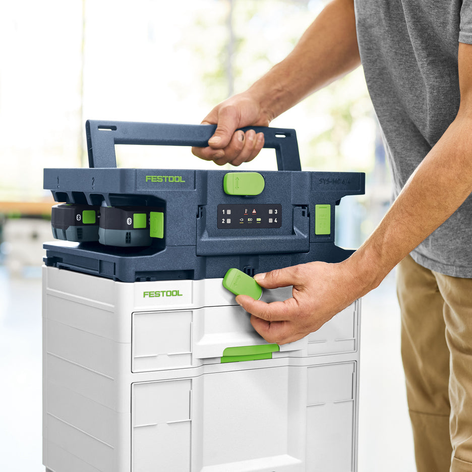 Festool Systainer Multi-Bay Rapid Charger being connected on top of a SYS-COMBI-3 with latch