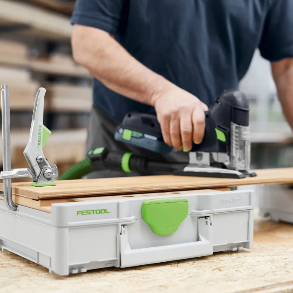 person using a Festool jigsaw to work on a piece of wood on top of Festool Systainer SYS3-MFT M 112