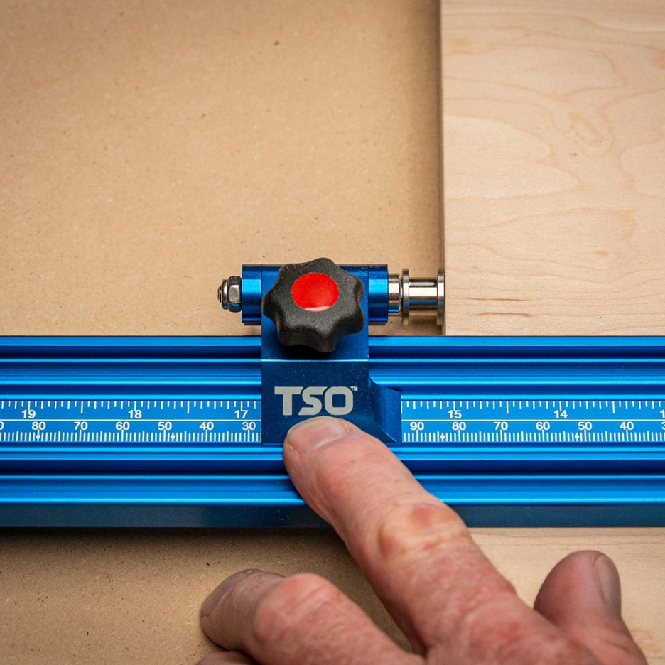 Hand touching Flip Stop Pro attached to  Parallel Guide System  Gen 1