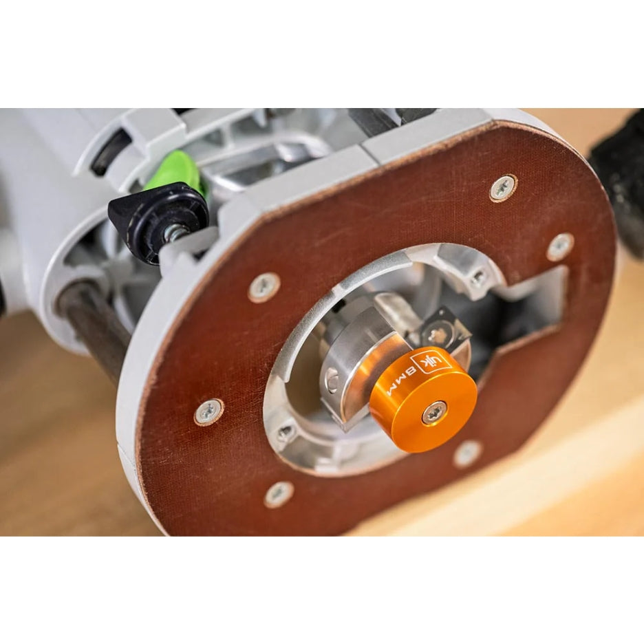 Close-up of bottom of router with UJK Tools 2-Flute Metric Multi-Rabbetting Router Bit with 1/2 Inch Shank