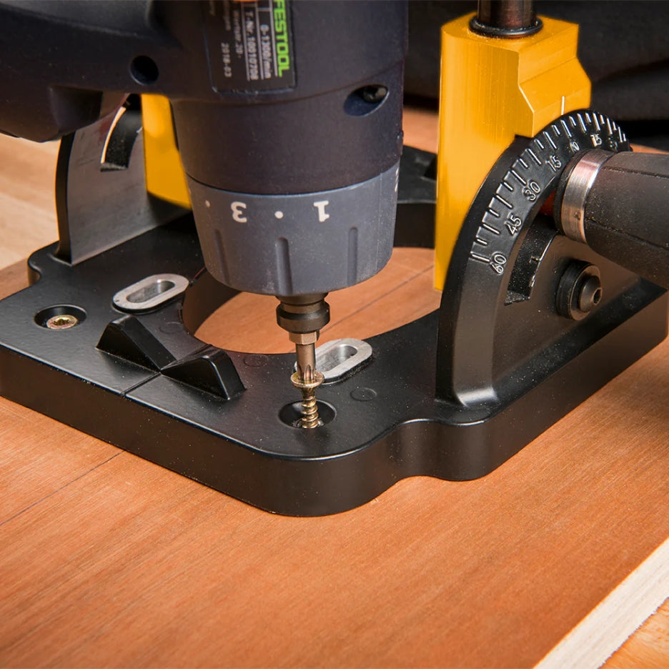 Drill Guide with 10mm Chuck being used on a wooden surface and screw  being inserted 