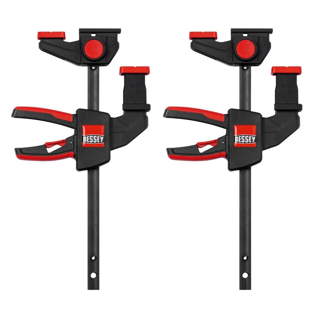 Pair of Bessey One-Handed Clamps configured to slide into the T-slot of a guide rail or other extrusion.