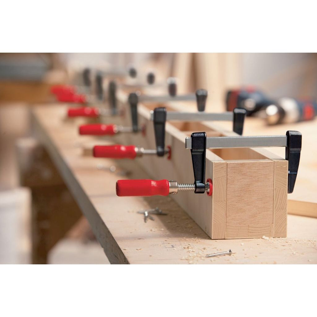 Bessey 330 Pound Lightweight F-Clamps holding together box for screwing