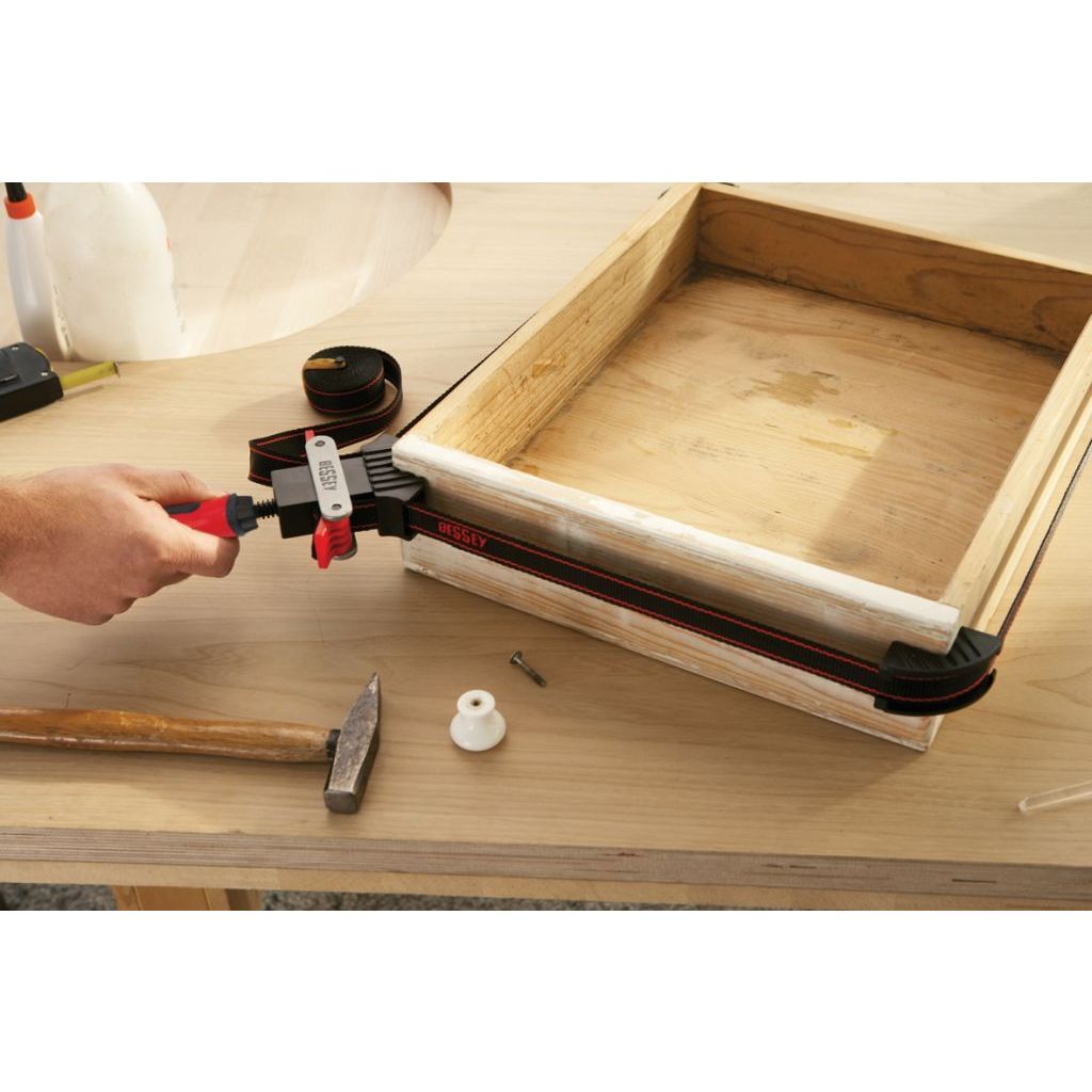 Bessey 12-Foot Strap Clamp holding drawer together for fastening