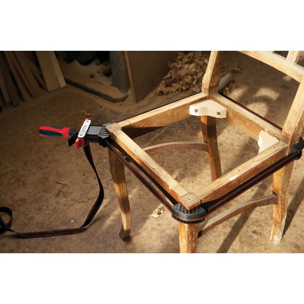 Bessey 12-Foot Strap Clamp holding chair frame together while attaching corner blocks