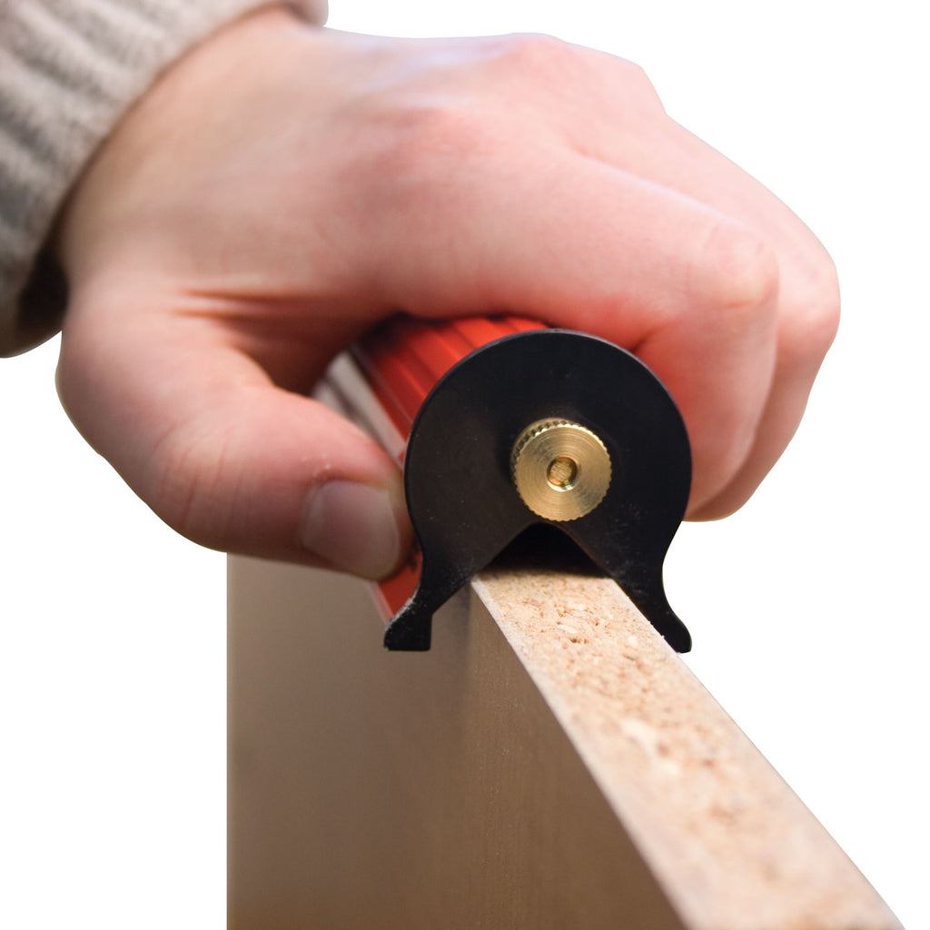 A worker uses the Fastbreak Edger to break both sharp, square edges of a veneered panel.