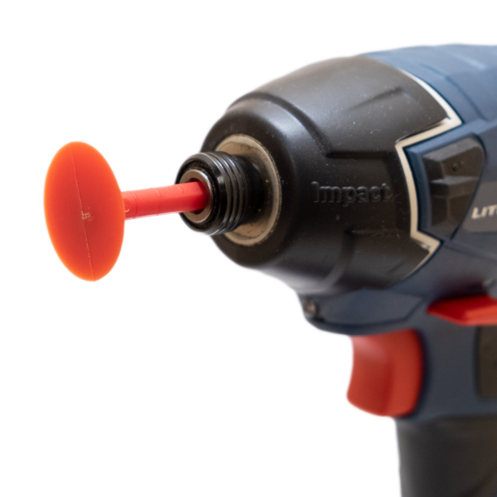 The 1-1/4 inch Kaizen Foam Spinner is installed in an impact driver, ready for use.