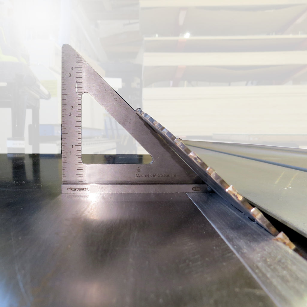The Magnetic Micro 45 degree Square attaches itself to a cast iron table saw so blade can be set to a 45 degree angle.