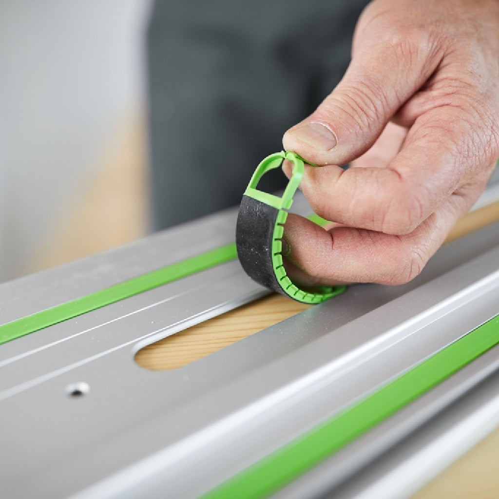 Removable adhesive pads for the Festool FS/2-KP guide rails can be lifted out of the guide rail recess for removal.