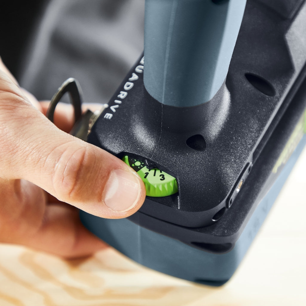 User adjusts the electronic clutch dial located at the back of the Festool TPC Cordless Percussion Drill handle.