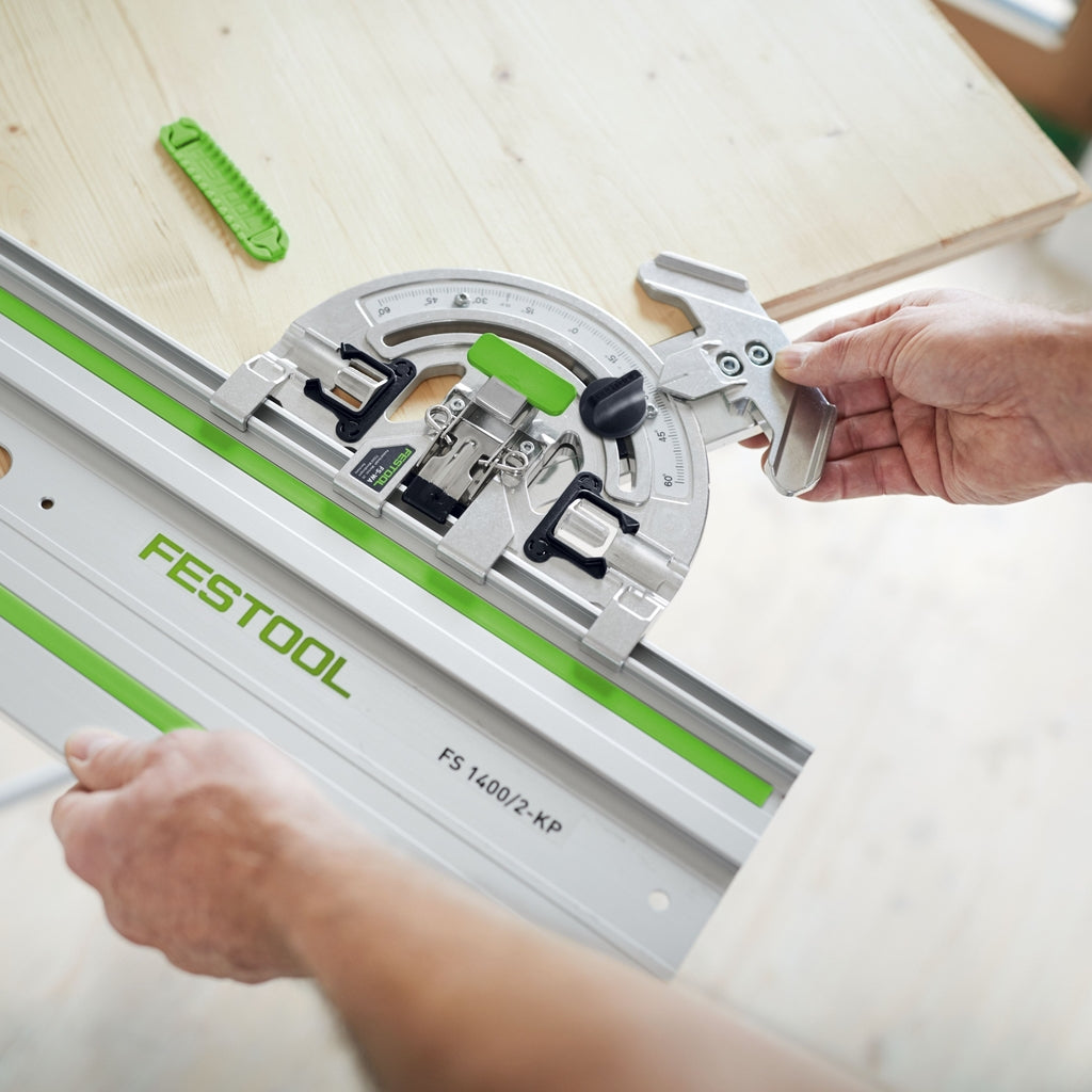 Hands adjust the Angle Stop which is clamped to a 55" Festool guide rail.