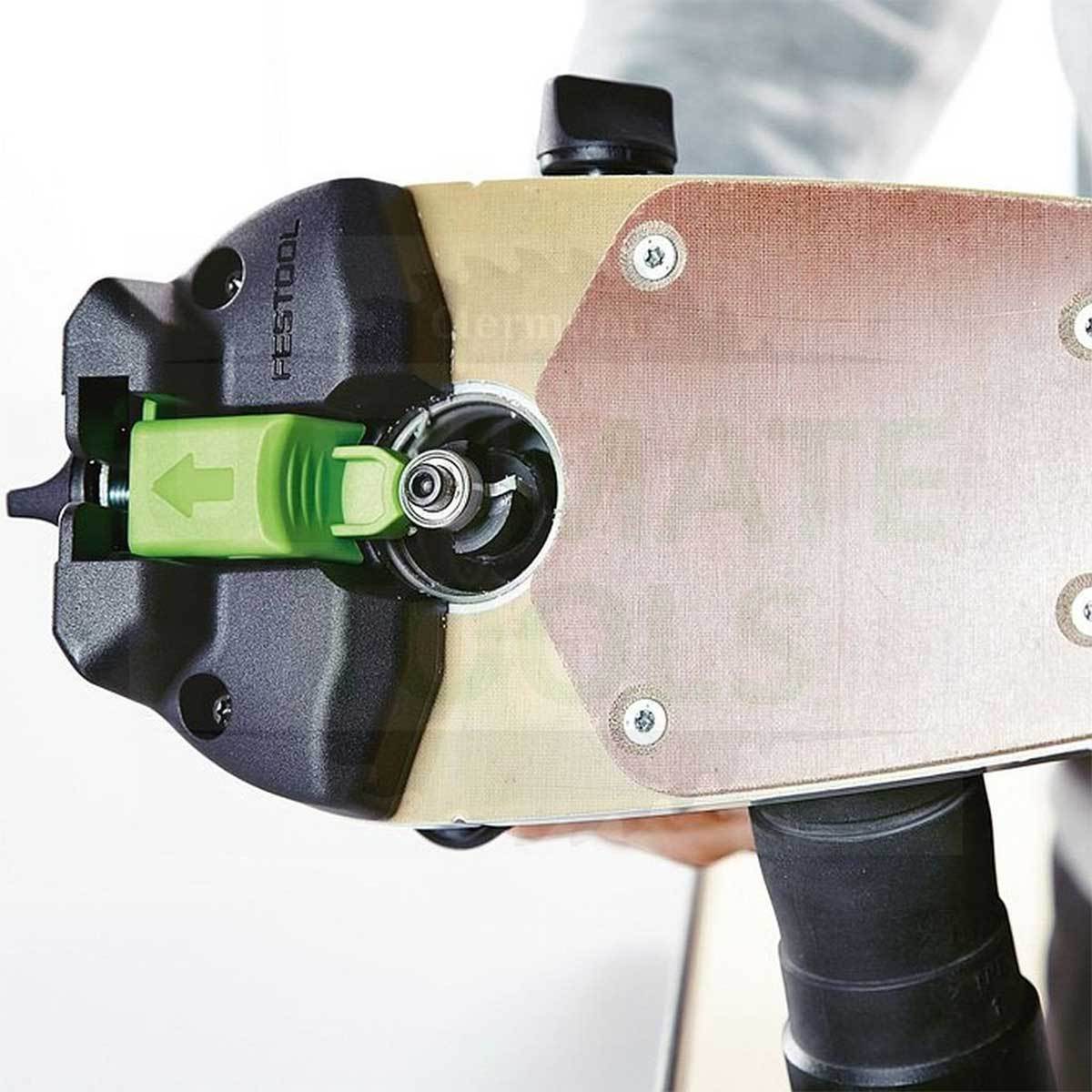 The bottom of the router baseplate has a raised plate and adjustable bearing brake to keep bearing from turning freely.