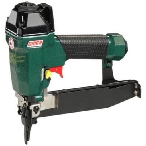 Side profile of Omer 90.38 18 gauge crown stapler showing fire selection switch, nose safety, trigger, and magazine.